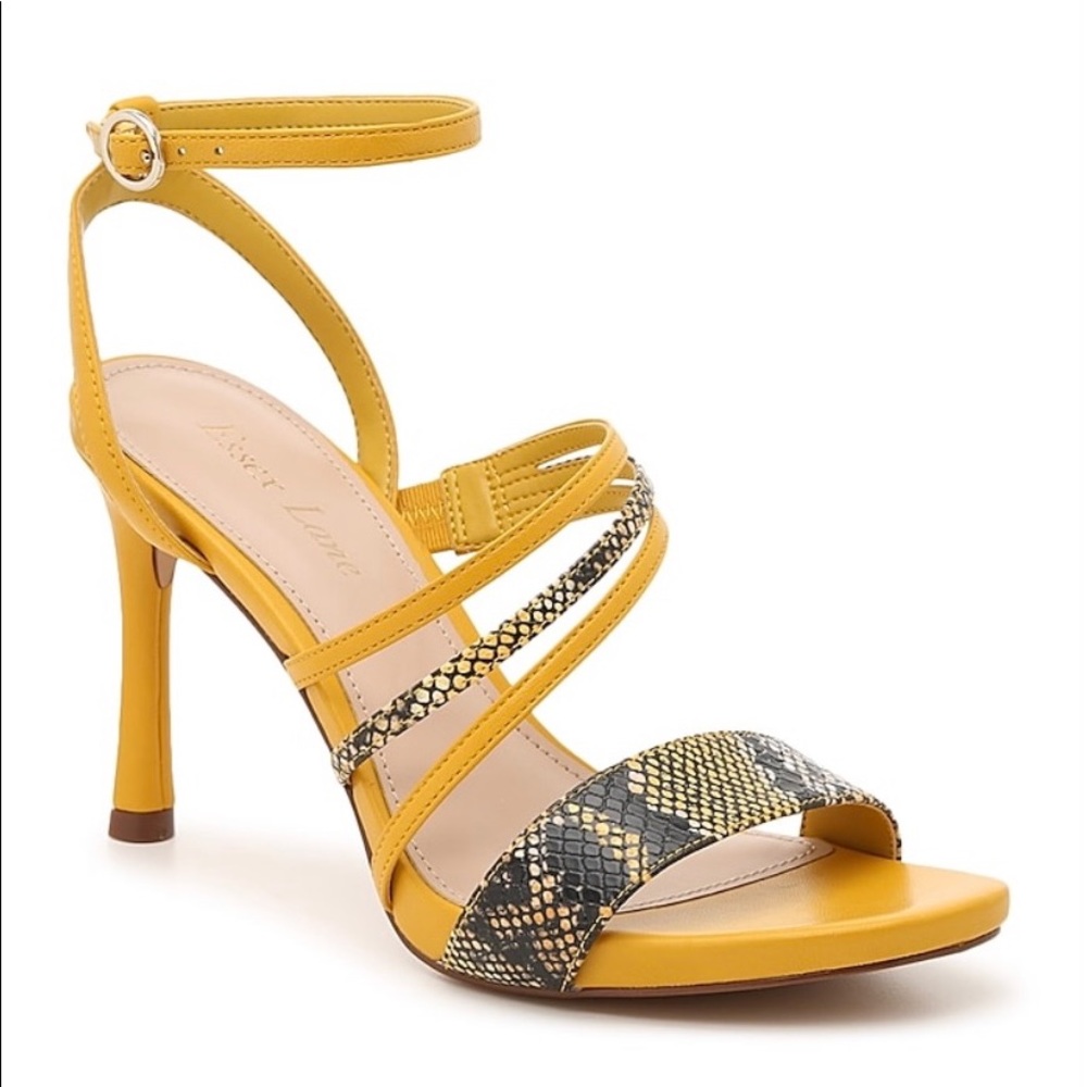 Brand new yellow/snake skin heels